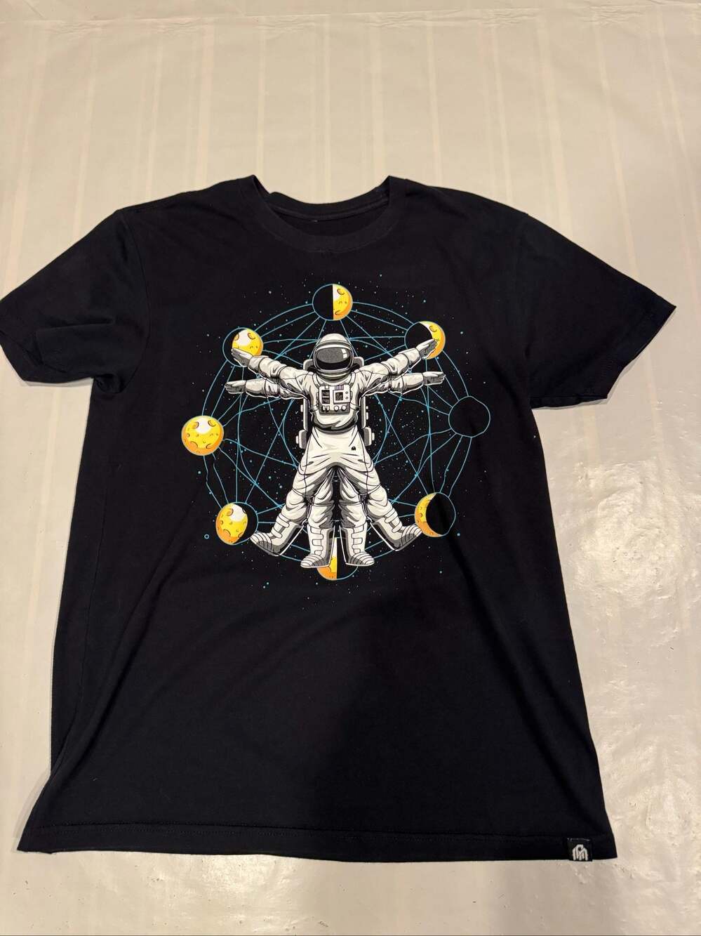 Men’s INTO THE AM Astronaut Moon Phases Space Graphic T-Shirt – Black – Medium